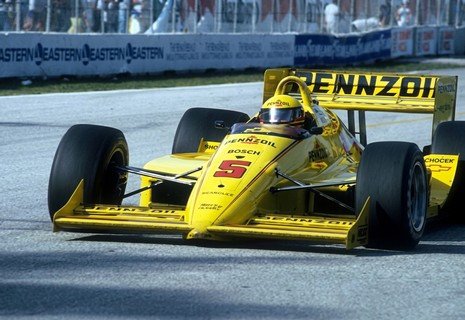 phan-ii-cac-dau-hieu-new-07.jpg A yellow race car on a track
AI-generated content may be incorrect.