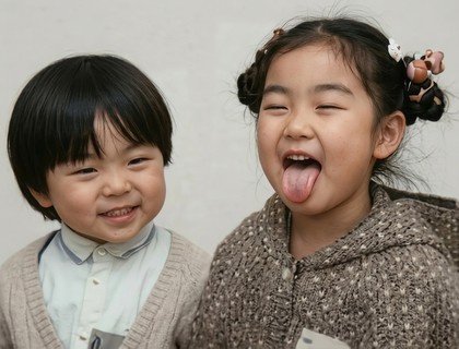 A group of children posing for a photo



AI-generated content may be incorrect.