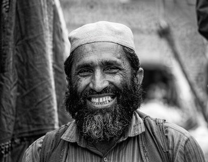 A person with a beard smiling



AI-generated content may be incorrect.